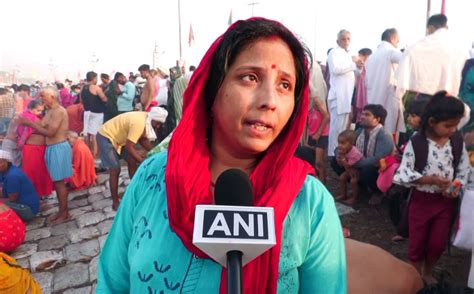 UP: Devotees take holy dip in River Ganga; offer prayers on Somvati ...