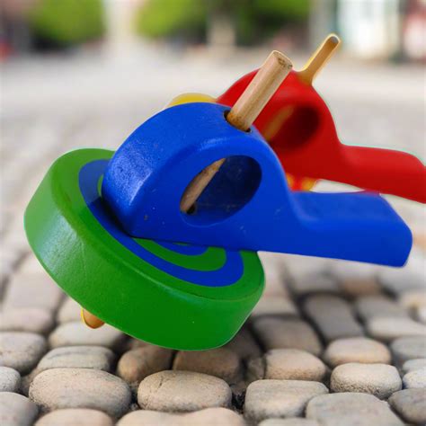 Safe Wooden Spinning Tops for Kids – Fun & Non-Toxic – Kids Bestie