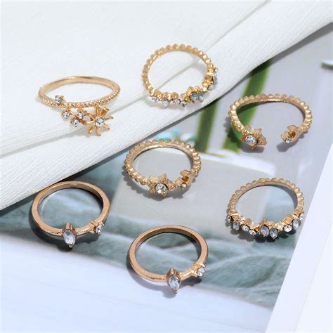 Golden Seven Piece White Crystal Multi Designs Ring Set – Vembley