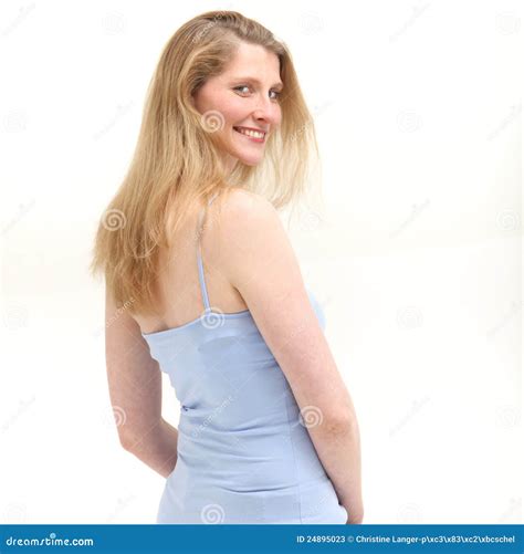 Smiling Woman Looking Over Her Shoulder Stock Image - Image of back ...