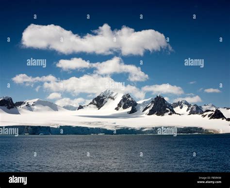 South Orkney Islands, Laurie Island coast, snow capped coastal ...