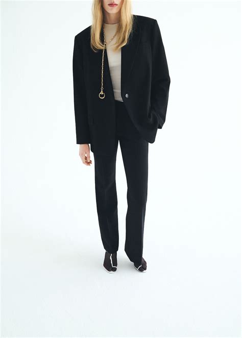 Pantalon flare taille normale - Femme | MANGO France métropolitaine