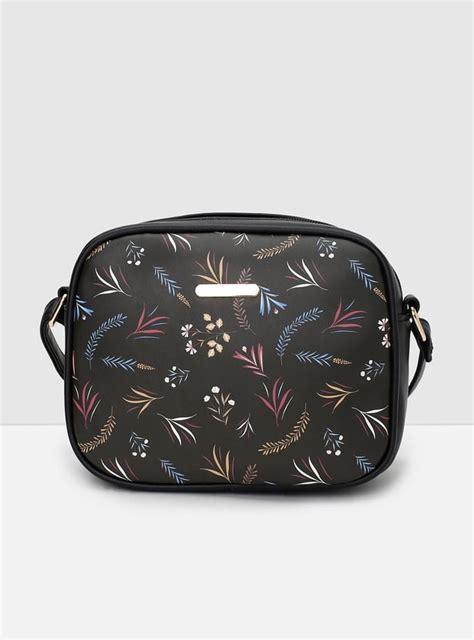 Buy Women Printed Zip Sling Bag Online at just Rs. 899.0 ...