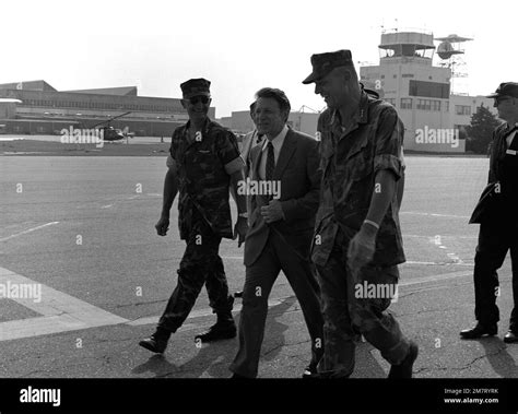 Secretary of Defense Caspar W. Weinberger is met at the Marine Corps ...