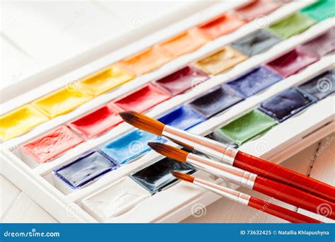 Brushes for Water Color Painting and Set of Watercolor Paints Stock ...
