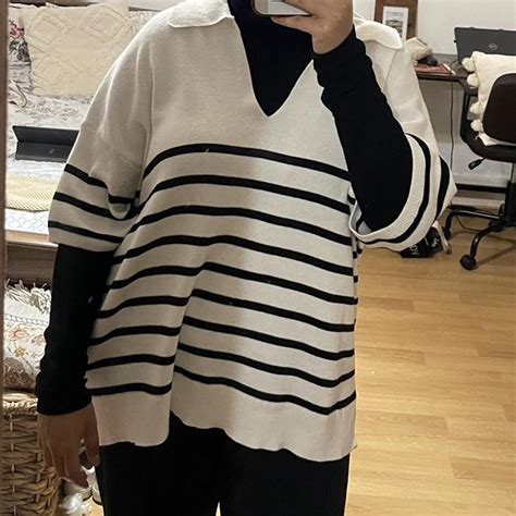 Striped white and black knit jumper with v neck... - Depop