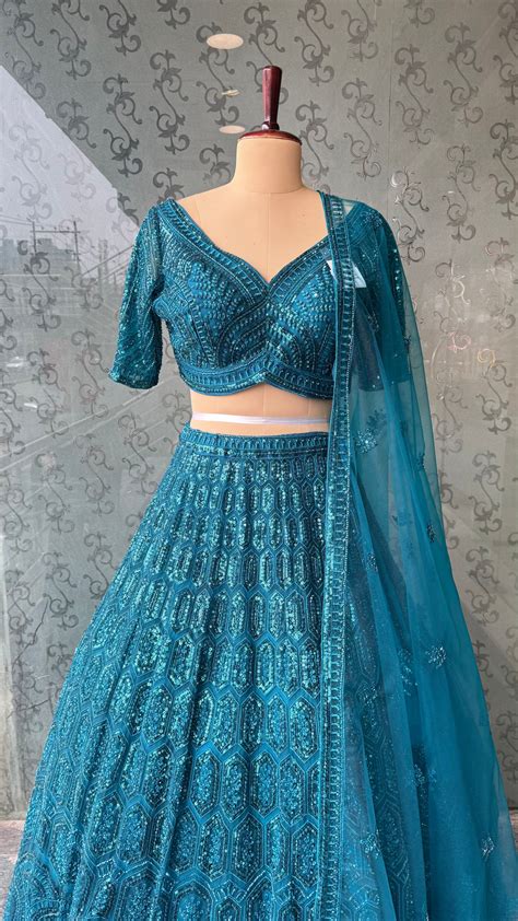 Teal Blue Sequined Embroidered Lehenga Choli with Net Dupatta – R K ...