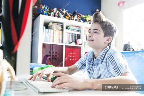 Boy Playing Computer Clip 的图像结果