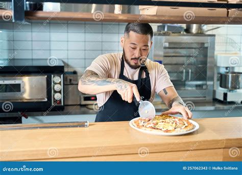 Image result for Someone Using Pizza Cutter