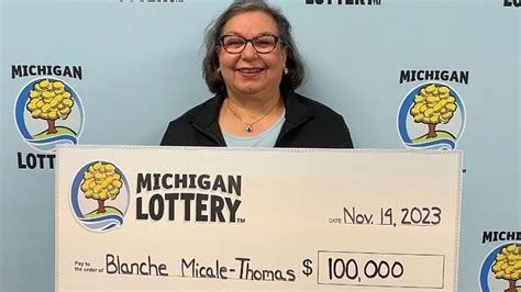 Woman wins top prize on losing lottery ticket with second try