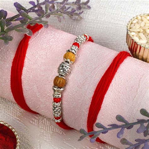 Send Silver Beads Traditional Rakhi Online