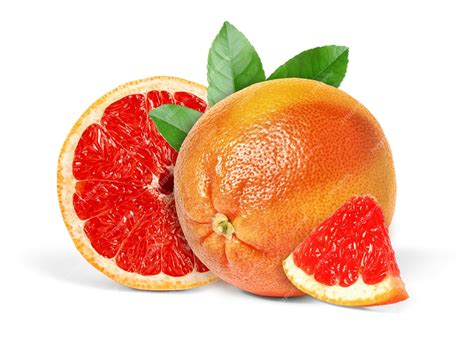 Premium Photo | Tasty ripe grapefruits and green leaves on white background