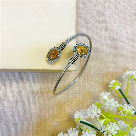Starika Silver Look Alike Dual Tone Bracelet for Women | Open Bypass ...