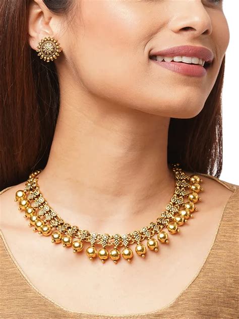 BINNI Kshirja Antique Gold-Toned Kolhapuri Necklace Set Price in India ...