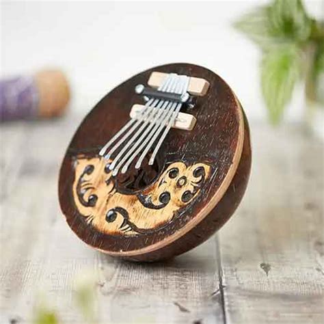Carved Kuta Thumb Piano – 7 Note Coconut Kalimba