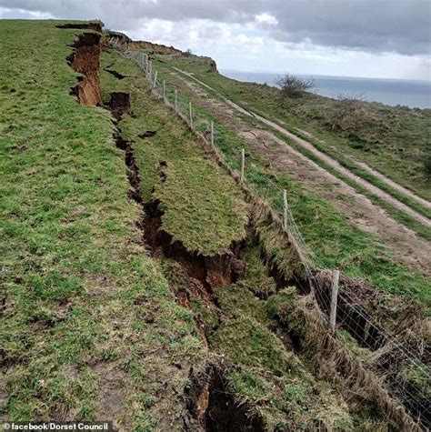 Thousands of tonnes of rock slump onto Dorset beach weeks after 300ft ...