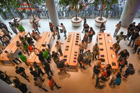 Apple Store launch: Tim Cook's Day in Mumbai, eats Vada pav with ...