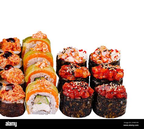 Different types of sushi rolls are lying in a row on a white background ...