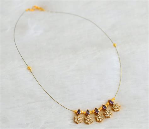 Gold tone cz purple flower invisible necklace dj-49265 – dreamjwell