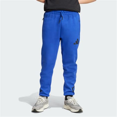 adidas Z.N.E. Tapered-Leg Pants - Blue | Free Shipping with adiClub