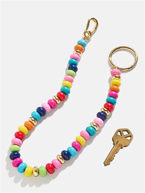 Flying Colors Bag Charm - Gold/Multi – Multicolored beaded bag charm ...