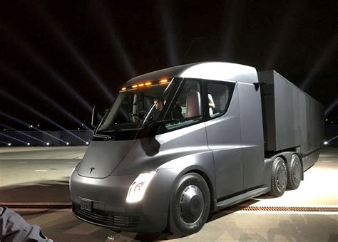Exclusive: PepsiCo to roll out 100 Tesla Semis in 2023, exec says | Reuters