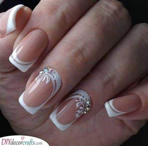 Floral white swirl nail designs