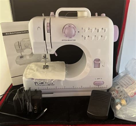 Singer Pixie Plus Sewing Machine 的图像结果