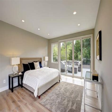 Contemporary Master Bedroom Design With King Size Panel Headboard Bed ...