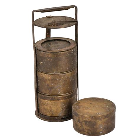 Old Brass Tiffin Box With Four Compartment And A Thick Disc Frame And Lock