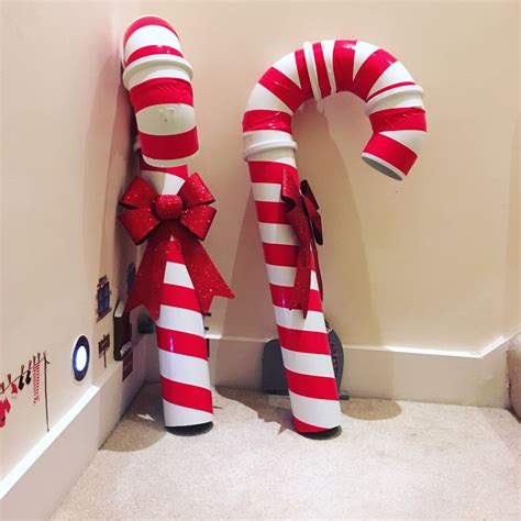 Giant DIY Candy canes | Diy christmas candy, Christmas candy cane ...