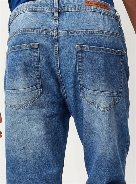 Buy Men Washed Carrot Fit Jeans Online at just Rs. 1399.0 ...