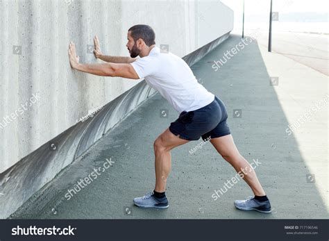 568 Standing Calf Stretch Images, Stock Photos, 3D objects, & Vectors | Shutterstock