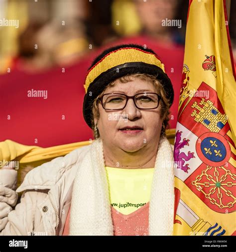 Barcelona, Spain. 06th Dec, 2015. Demonstrators holding a giant Spanish ...