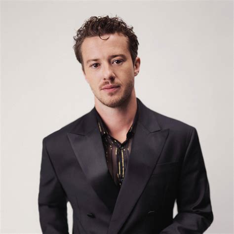 Download Joseph Quinn Stylish Profile Wallpaper | Wallpapers.com