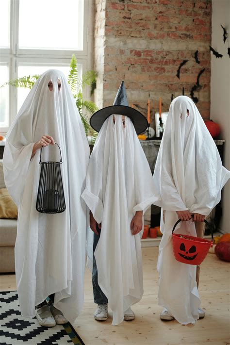 People in Ghost Costumes · Free Stock Photo