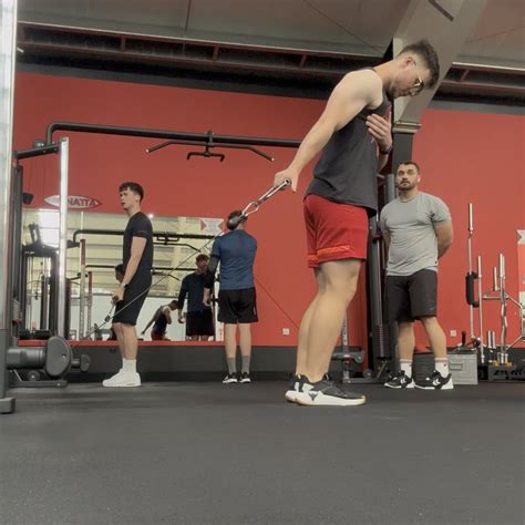 Image result for Bicep Curl Machine Exercise