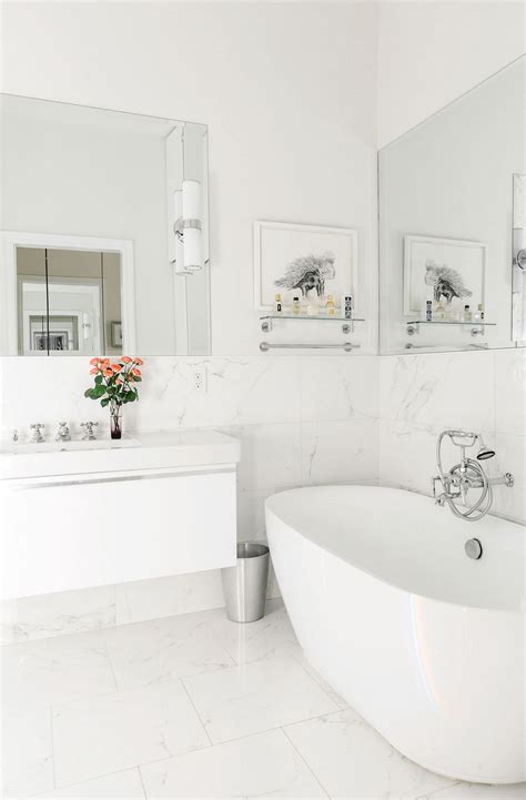 Marble tiles in a bathroom half way up the wall | White marble ...