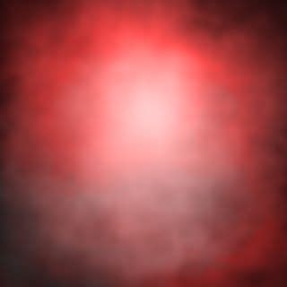 a blurry image of red light in the dark night sky with white and black ...