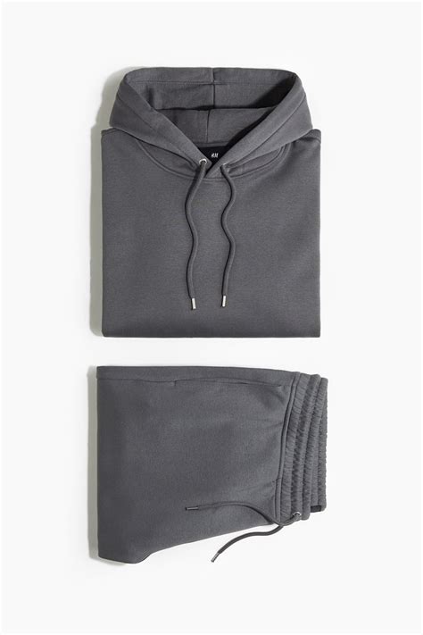 2-piece Loose Fit hoodie and joggers set - Dark grey - Men | H&M HK