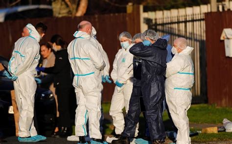 Woman detained in investigation of 2 half-sisters’ bodies buried in suitcases, Cleveland police say