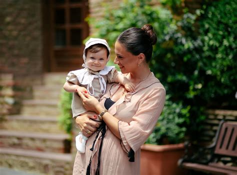 Portrait of Woman Holding Newborn Baby · Free Stock Photo