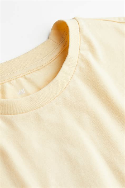 Regular Fit T-shirt - Light yellow - Men | H&M IN