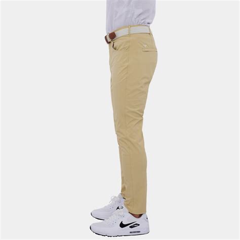 Shop Mens Slim-Fit Golf Pants: The Avalon Tour Pant - Color Sand