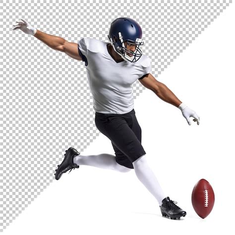 Focused american football athlete in white performing field goal kick ...