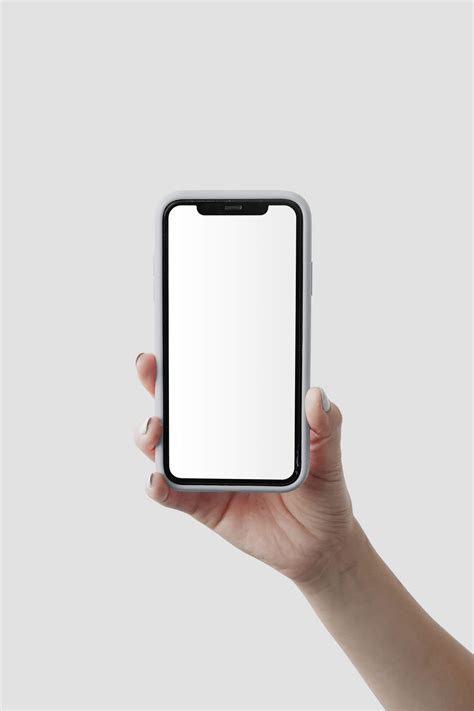 Free Hand Holding iPhone Mockup PSD - PsFiles