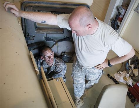 602nd Maint. Co. Soldiers repair humvees for transfer to Iraqi security ...