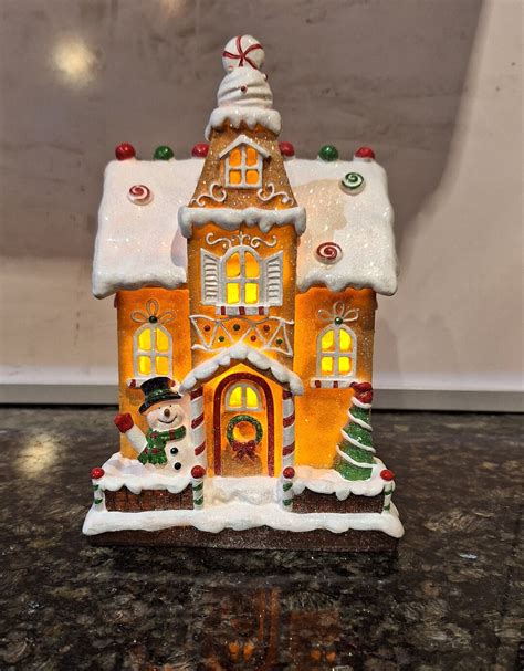 Christmas Light up Gingerbread House With a Frosted Roof Decorated With ...