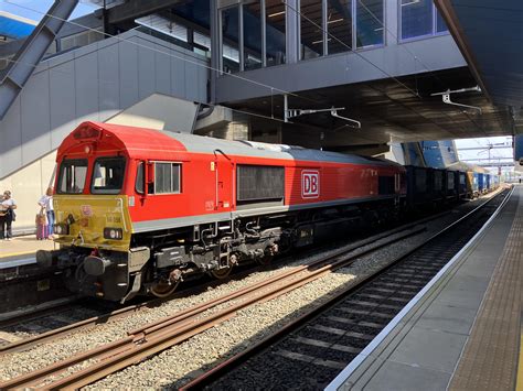 British Rail Class 66 (Unit Number 66056) diesel locomotive passes ...