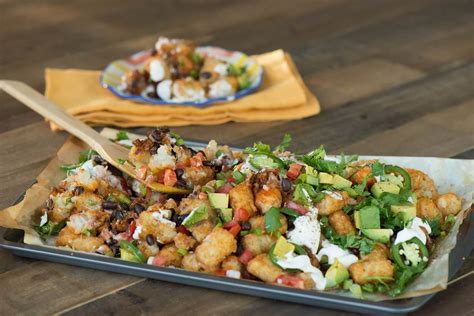 Totchos - Tater Tots with Cacique Dos Quesos Blend Shredded Cheese ...